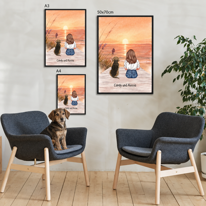 Posters personnalisés d'un chien et d'une personne sur la plage au coucher du soleil, avec cadres noirs.